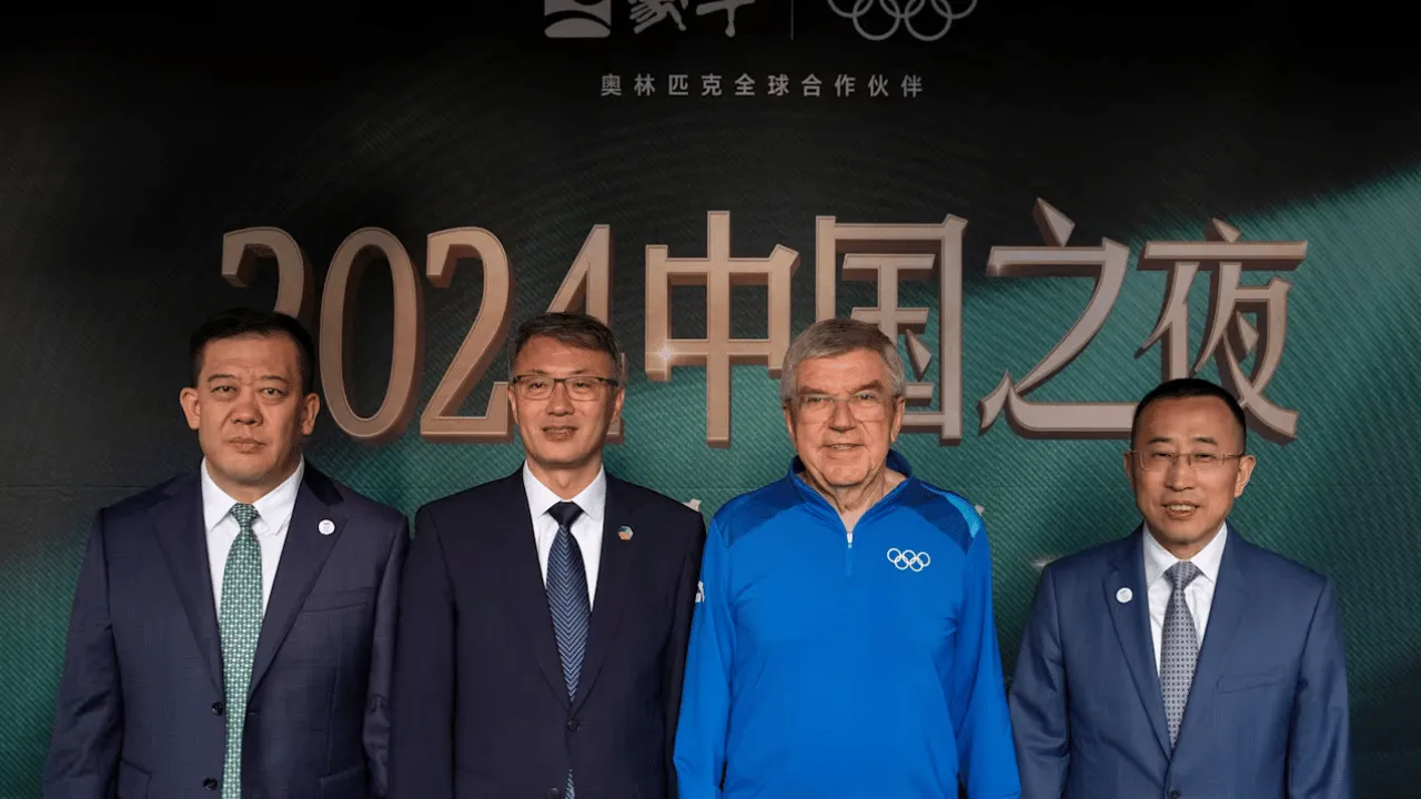 Rolling the Dice: IOC President Celebrates with Olympians and Stars at Mengniu's China Night